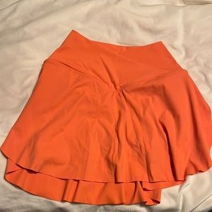 A orange crossover HALARA skirt. Its a XS.